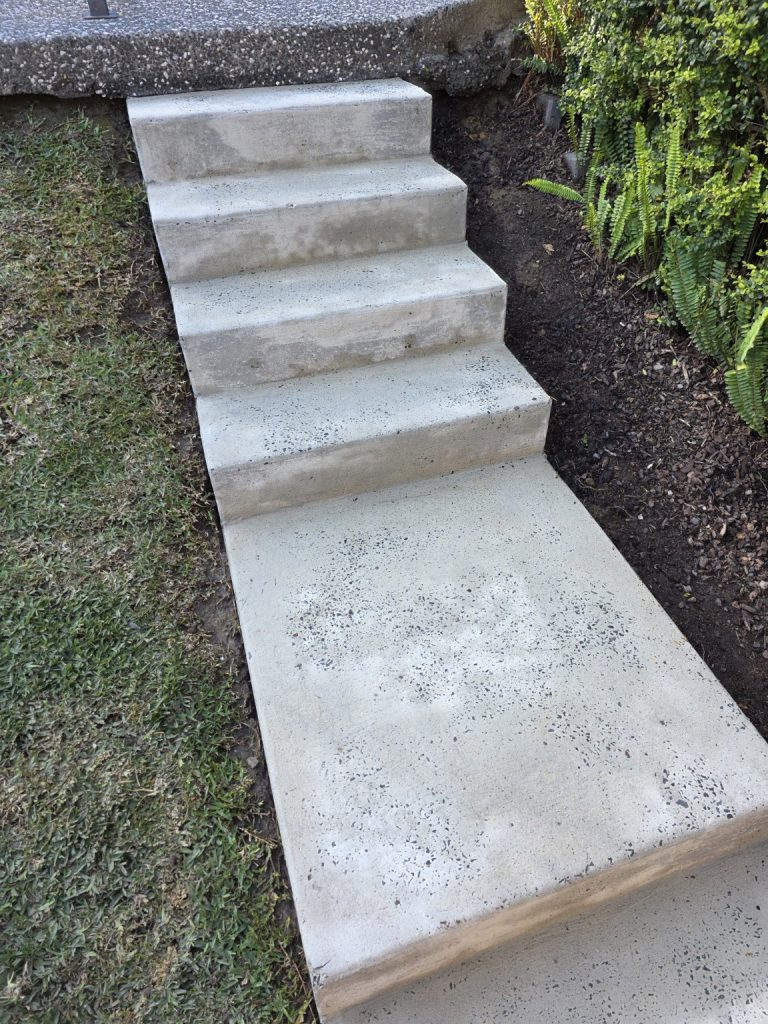 Concrete garden steps following pressure cleaning in Mount Ousley