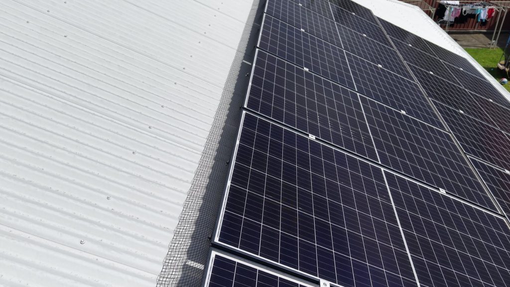 Bird proofing mesh fitted around the solar panels on the Warilla roof