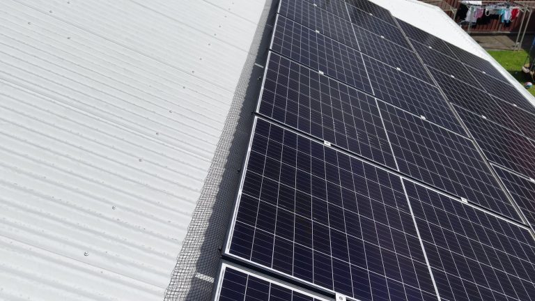 Bird proofing mesh fitted around solar panels in Warilla