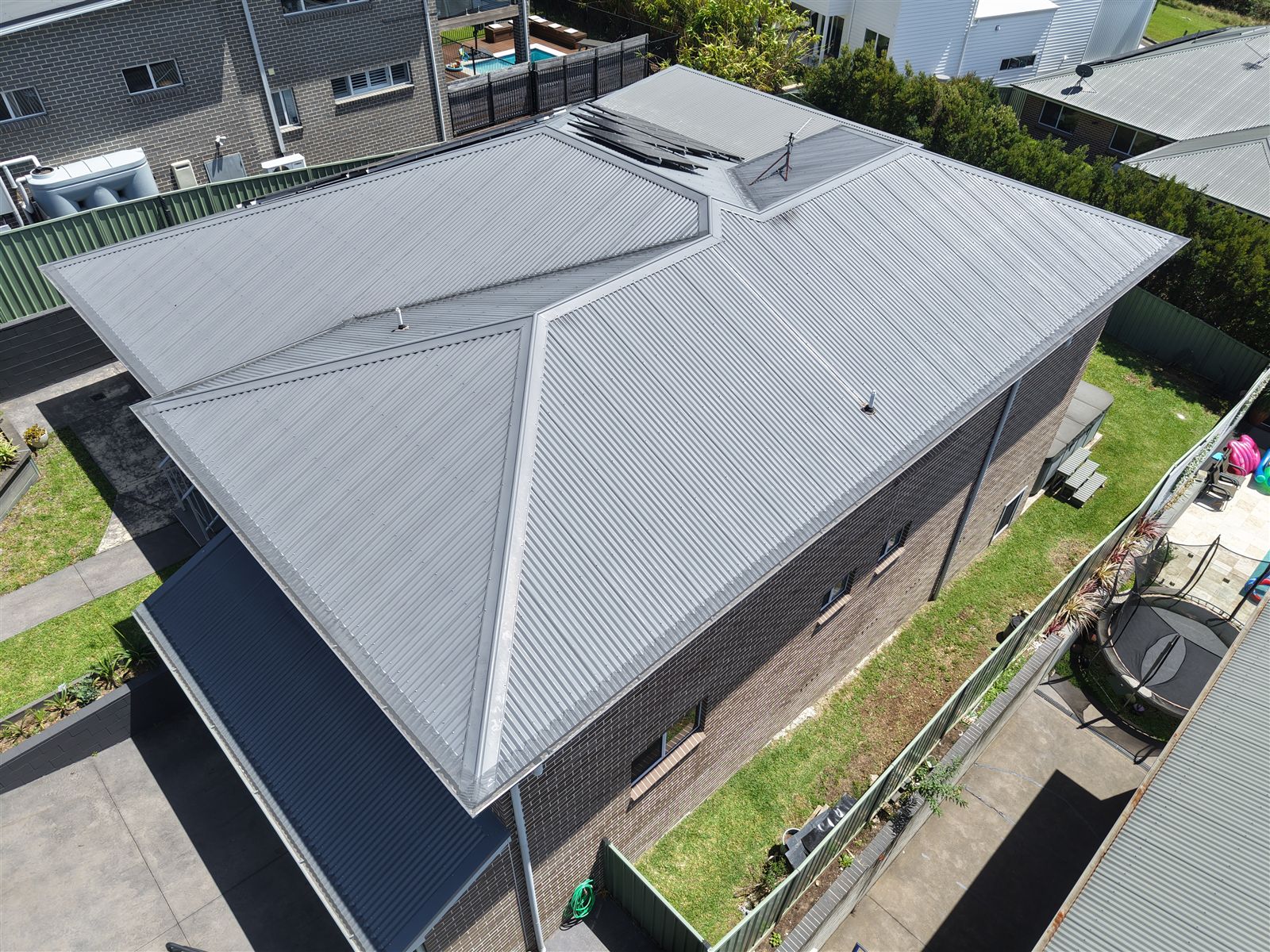 Drone view of a finished aluminium gutter guard install