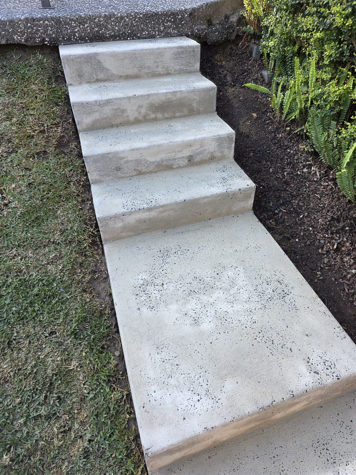 Concrete steps pressure washed in Mount Ousley