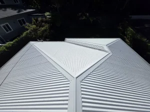 Wombarra roof after washing, showing clean corrugated roof sheets and the intersecting roof lines